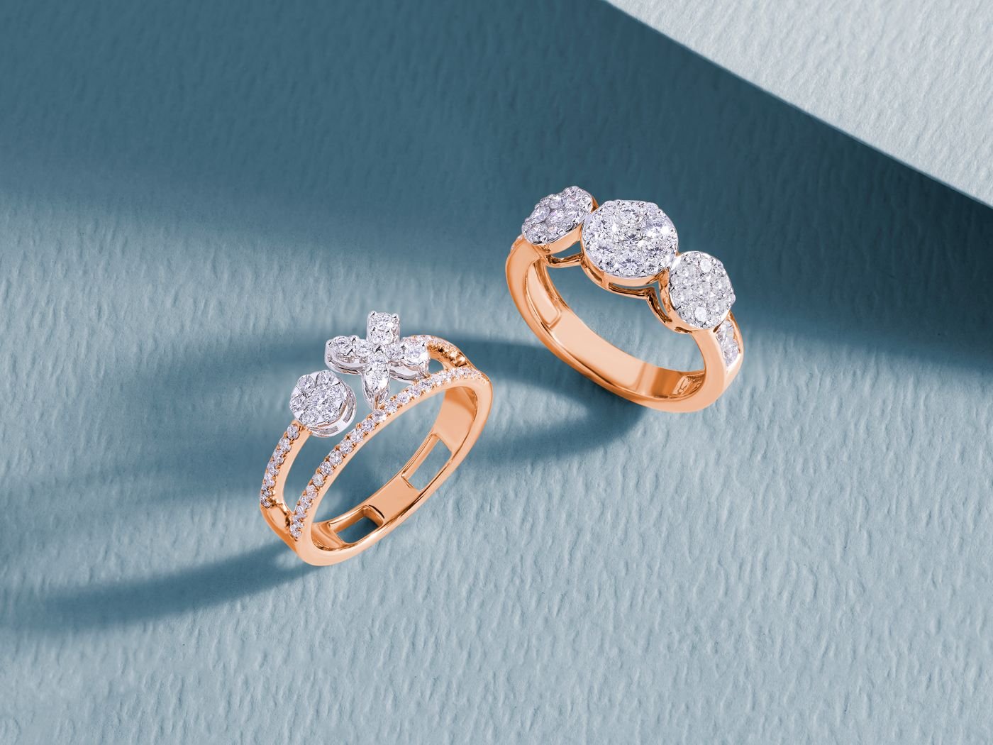 Luxurious diamond rings on a dark surface